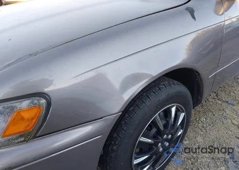 1995 Toyota Corolla из США, поврежденный, VIN 2T1AE04B5SC088781